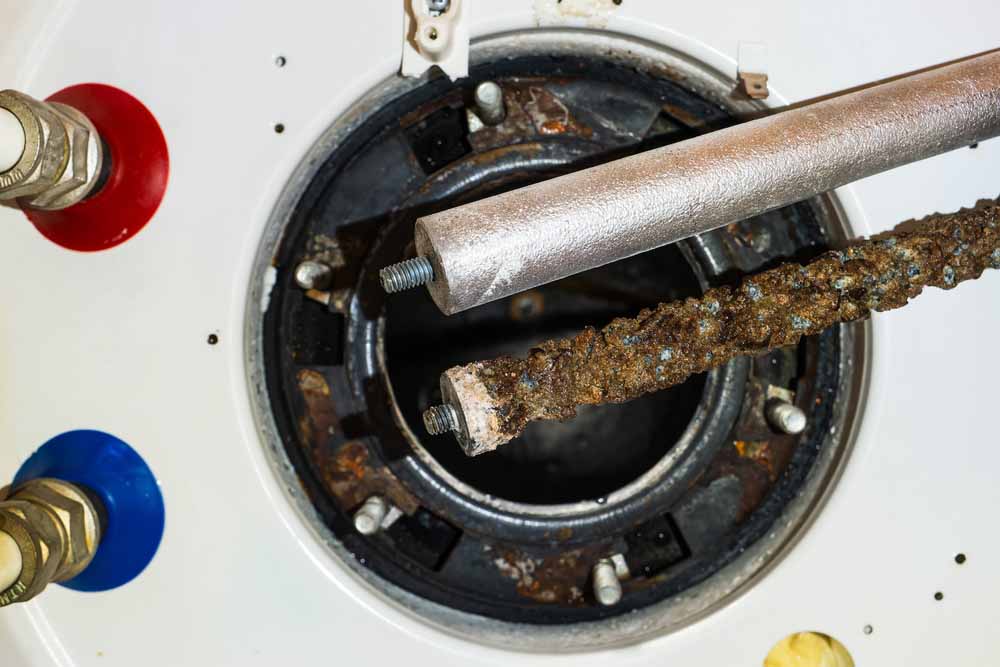 diagram of a water heater anode rod showing corrosion