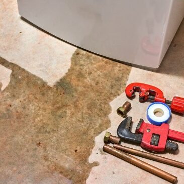 water leaking from under appliance